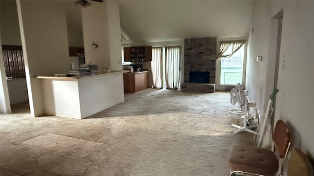 1830 Lansdowne Dr, Richmond, TX 77406 - unfurnished living room featuring light colored carpet and a large fireplace
