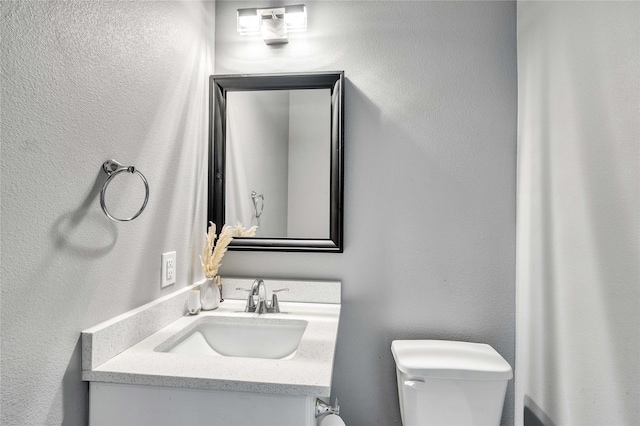 108 Bianca Cir, Del Valle, TX 78617 - half bath featuring vanity and a textured wall