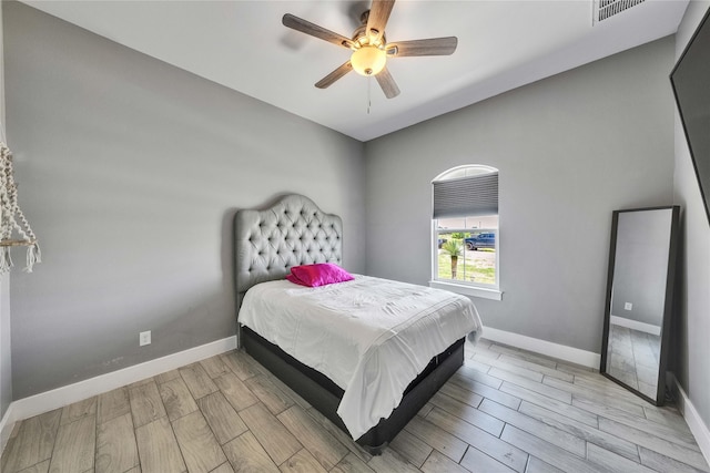 108 Bianca Cir, Del Valle, TX 78617 - bedroom featuring wood finished floors and a ceiling fan