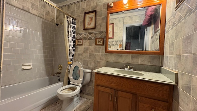 12414 Frazier River Dr, Houston, TX 77050 - bathroom with tile walls, vanity, shower / bathtub combination with curtain, and tile patterned floors