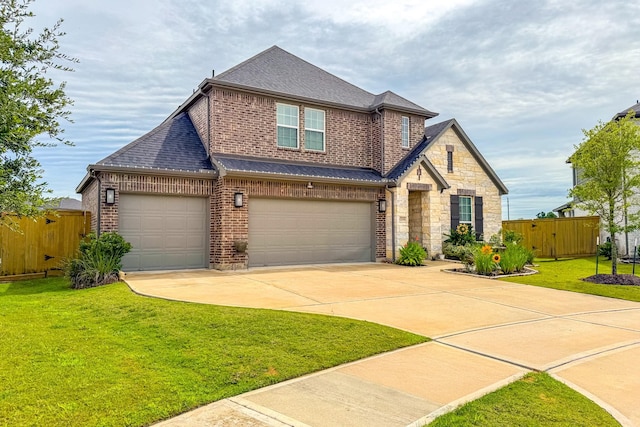 1206 Raburn Run Ln, Tomball, TX 77375 - view of front of house featuring brick siding, roof with shingles, concrete driveway, and a garage
