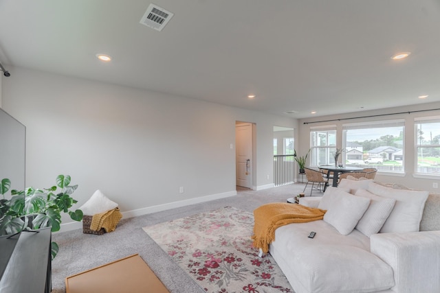 1206 Raburn Run Ln, Tomball, TX 77375 - living area featuring light carpet and recessed lighting