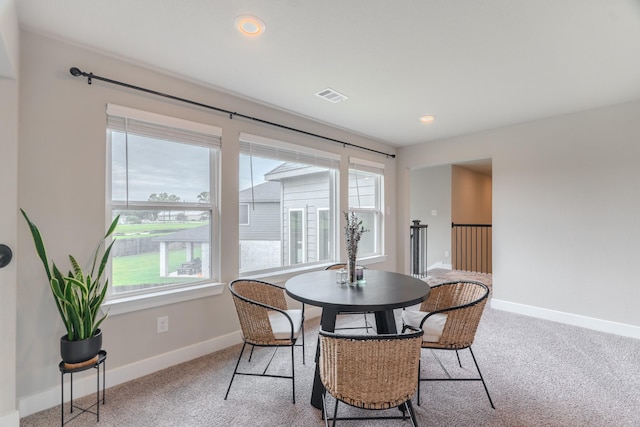 1206 Raburn Run Ln, Tomball, TX 77375 - dining area with light colored carpet and recessed lighting