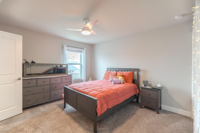 1206 Raburn Run Ln, Tomball, TX 77375 - bedroom featuring light carpet and a ceiling fan