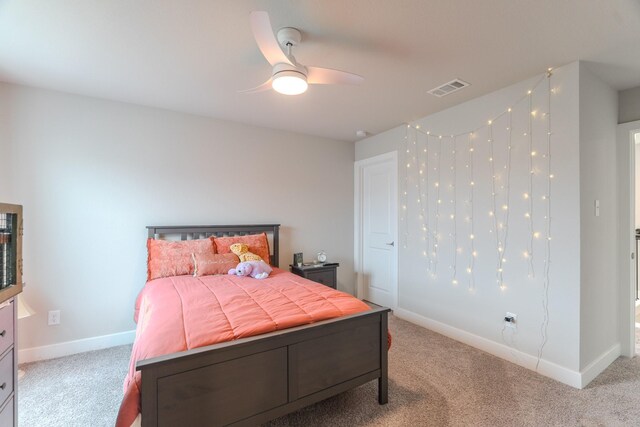 1206 Raburn Run Ln, Tomball, TX 77375 - bedroom with light carpet and ceiling fan
