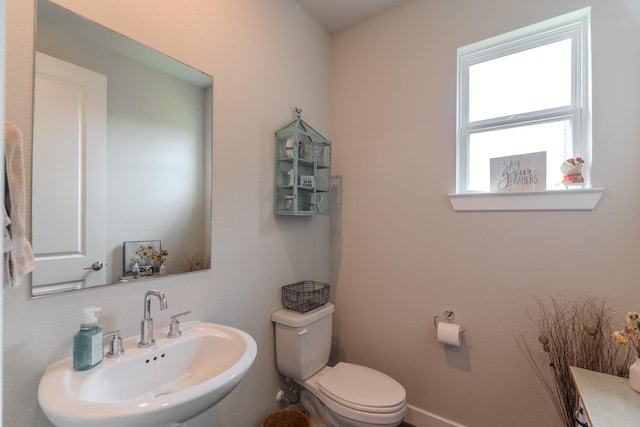 1206 Raburn Run Ln, Tomball, TX 77375 - bathroom featuring a sink and toilet