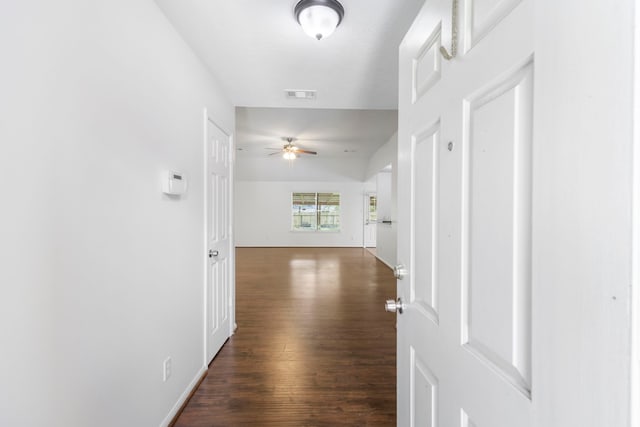 7023 Hayden Dr, Magnolia, TX 77354 - corridor featuring dark wood-style flooring
