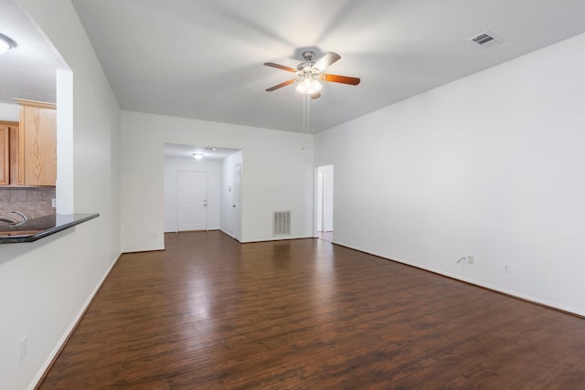 7023 Hayden Dr, Magnolia, TX 77354 - unfurnished living room featuring a ceiling fan and wood finished floors