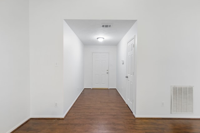 7023 Hayden Dr, Magnolia, TX 77354 - hall with dark wood-style floors and baseboards