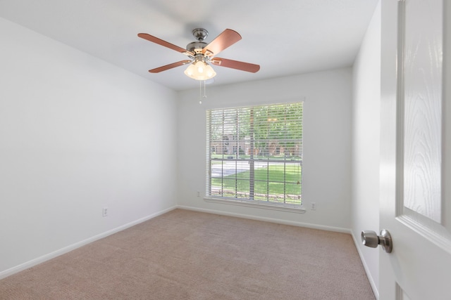 7023 Hayden Dr, Magnolia, TX 77354 - unfurnished room with light colored carpet and a ceiling fan
