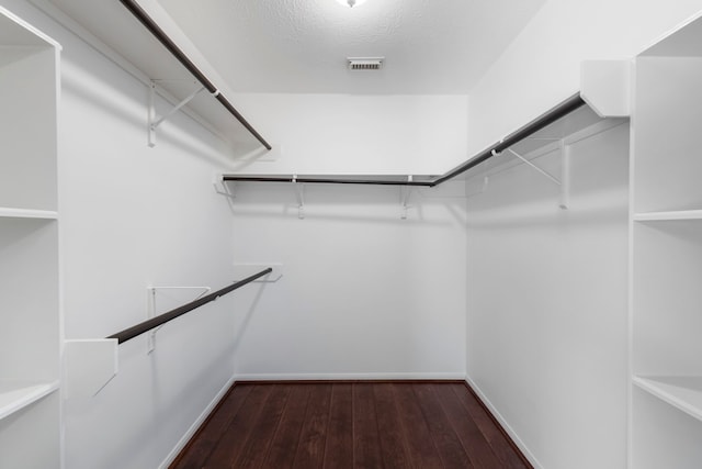 7023 Hayden Dr, Magnolia, TX 77354 - spacious closet with hardwood / wood-style flooring