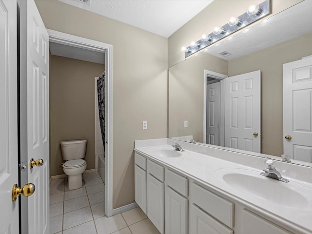247 Private Road 635, Dayton, TX 77535 - full bathroom with double vanity, tile patterned floors, and shower / bath combo with shower curtain