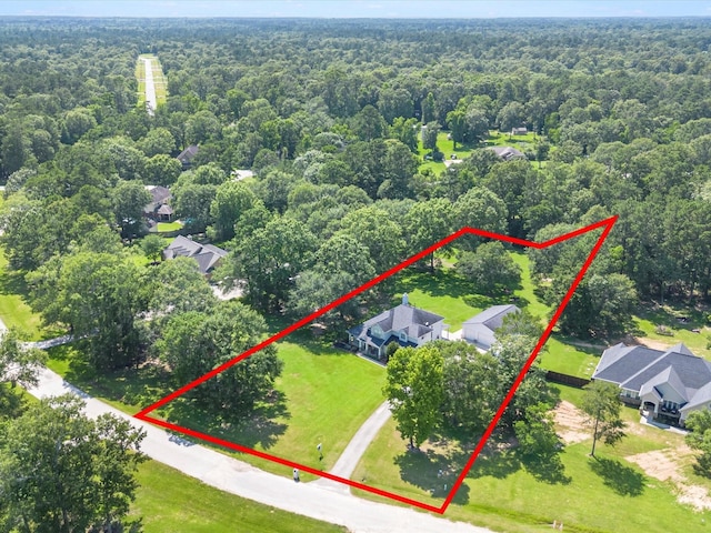 247 Private Road 635, Dayton, TX 77535 - aerial view of property's location with a heavily wooded area and property parcel outlined