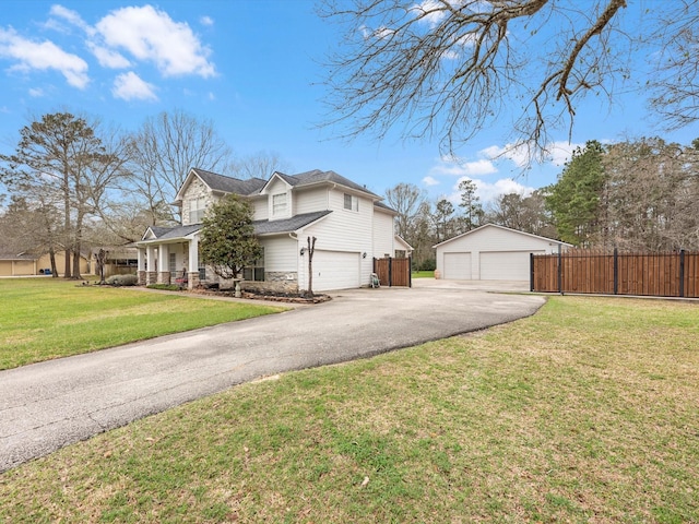 247 Private Road 635, Dayton, TX 77535 - view of side of property featuring stone siding and a garage