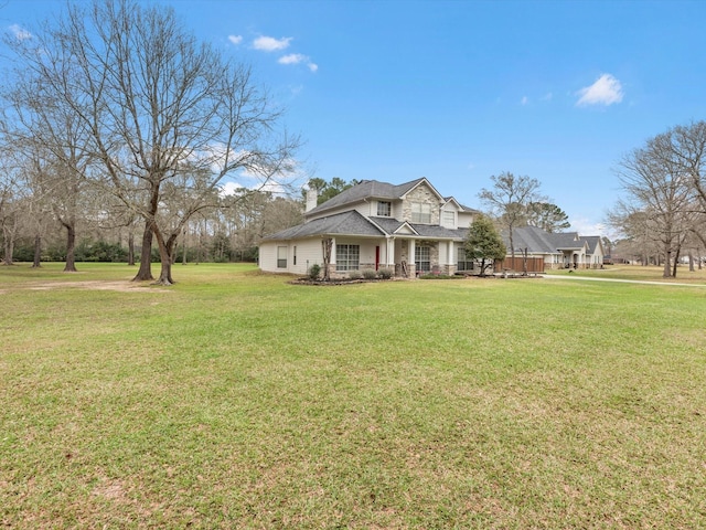 247 Private Road 635, Dayton, TX 77535 - view of front facade with covered porch and a front yard