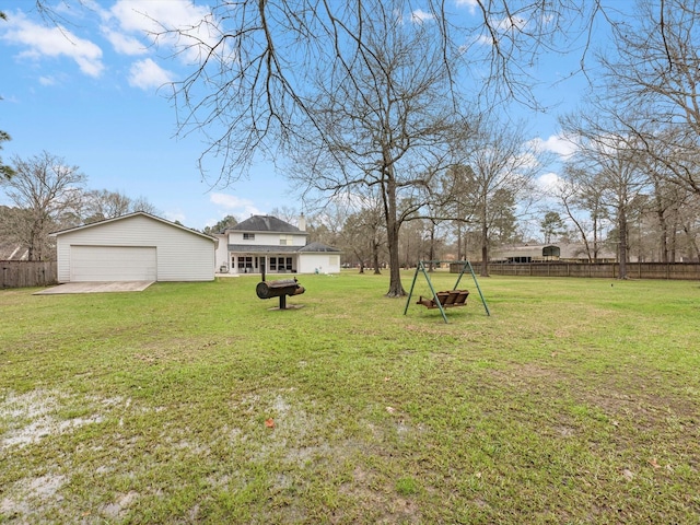 247 Private Road 635, Dayton, TX 77535 - view of yard featuring an outdoor structure and a detached garage