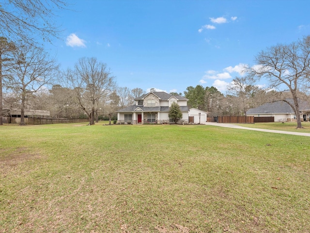 247 Private Road 635, Dayton, TX 77535 - traditional-style house with concrete driveway and an attached garage