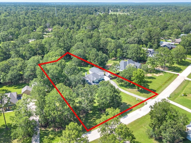 247 Private Road 635, Dayton, TX 77535 - aerial overview of property's location featuring a forest and property boundaries highlighted