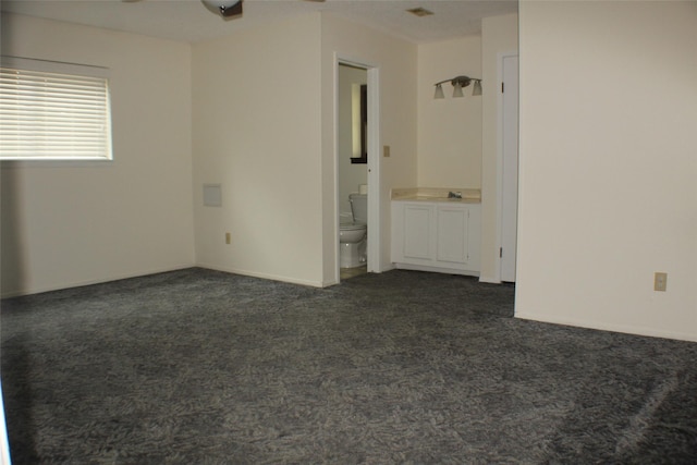 1408 Brandon Ct, Bay City, TX 77414 - unfurnished room featuring dark colored carpet