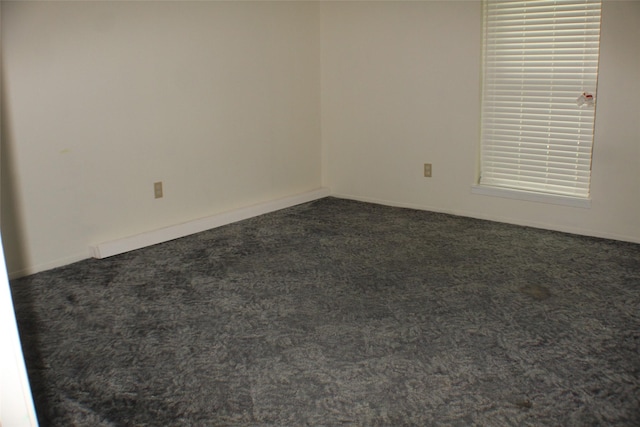 1408 Brandon Ct, Bay City, TX 77414 - unfurnished room featuring dark colored carpet