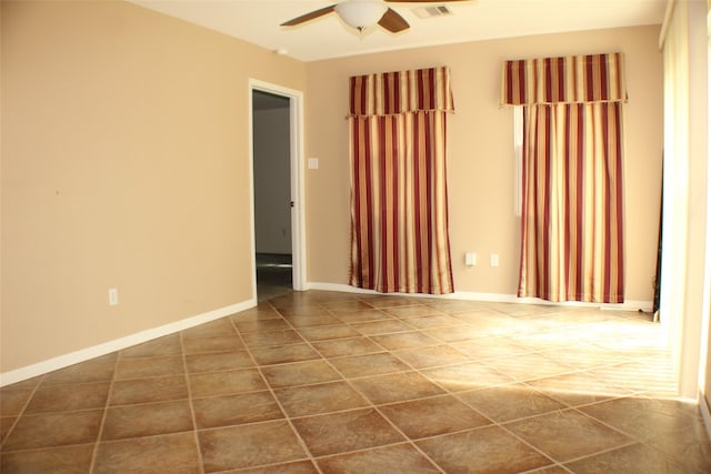 1408 Brandon Ct, Bay City, TX 77414 - spare room with ceiling fan and tile patterned flooring