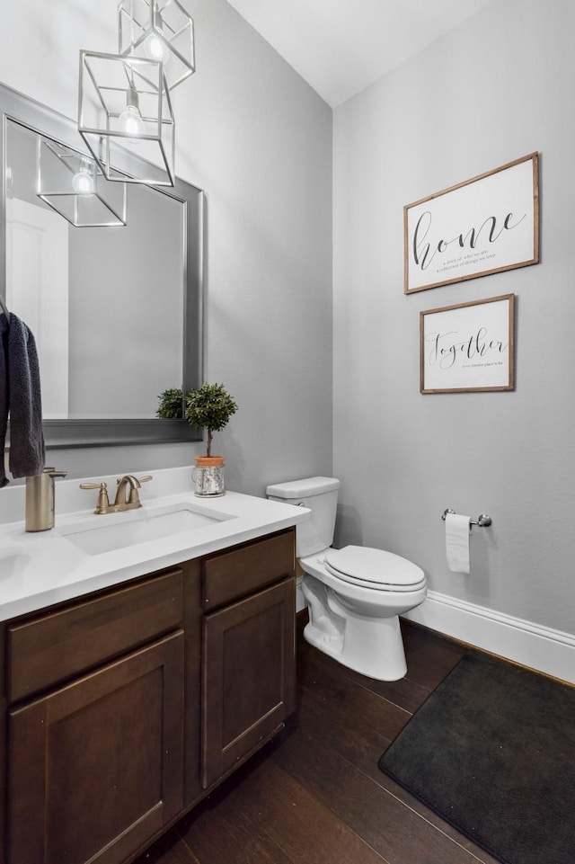 7714 S Fall Run Xing, Houston, TX 77055 - bathroom with vanity and wood finished floors