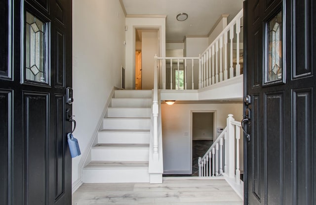 14507 Louetta Rd, Cypress, TX 77429 - entryway featuring stairs, wood finished floors, and crown molding