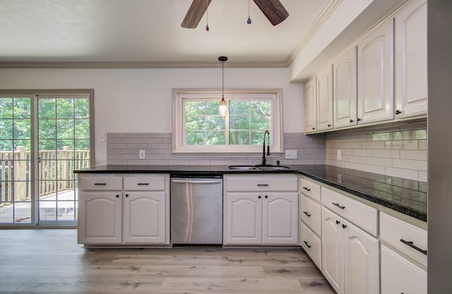 14507 Louetta Rd, Cypress, TX 77429 - kitchen with dishwasher, white cabinetry, a ceiling fan, ornamental molding, and tasteful backsplash