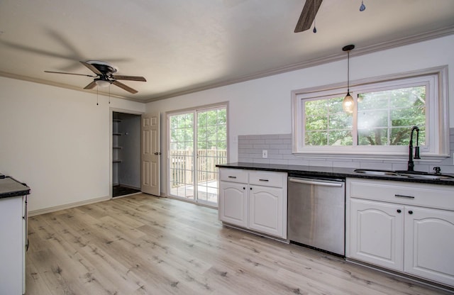 14507 Louetta Rd, Cypress, TX 77429 - kitchen with stainless steel dishwasher, ceiling fan, crown molding, white cabinets, and light wood-style flooring