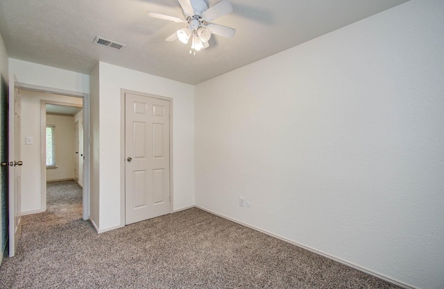 14507 Louetta Rd, Cypress, TX 77429 - unfurnished bedroom featuring carpet floors and ceiling fan