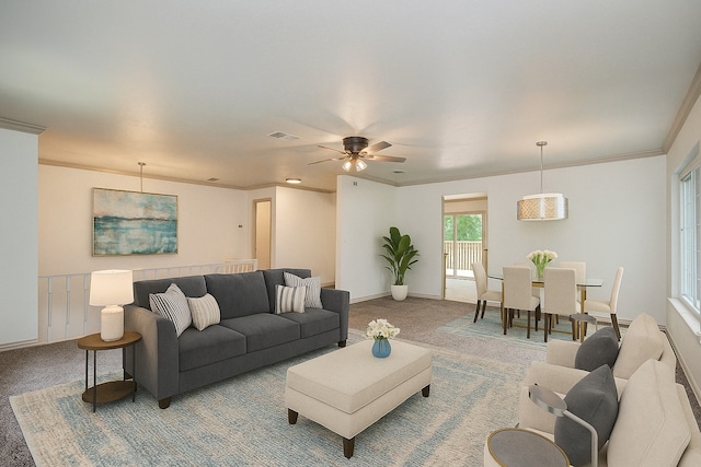 14507 Louetta Rd, Cypress, TX 77429 - living area featuring light colored carpet, crown molding, and a ceiling fan