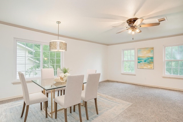 14507 Louetta Rd, Cypress, TX 77429 - dining space featuring light carpet, healthy amount of natural light, ornamental molding, and ceiling fan