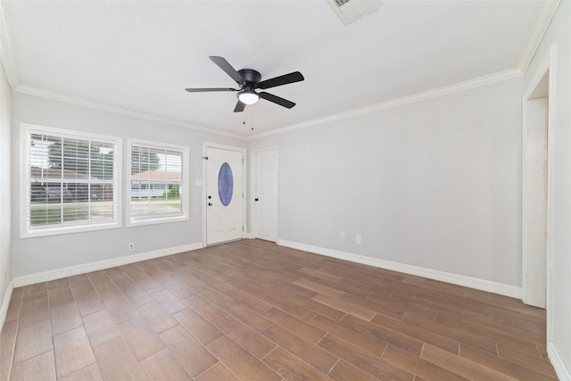 507 S Kansas St, La Porte, TX 77571 - unfurnished room with dark wood finished floors, ceiling fan, and ornamental molding