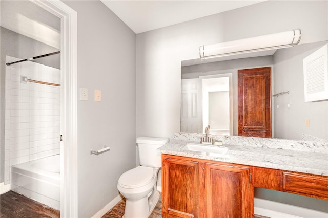14600 Fonmeadow Dr Unit 201, Houston, TX 77035 - full bathroom featuring vanity, wood finished floors, and shower / bathtub combination