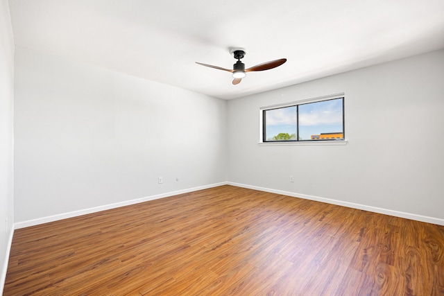10328 Longmont Dr Unit 47/1, Houston, TX 77042 - unfurnished room with wood finished floors and ceiling fan
