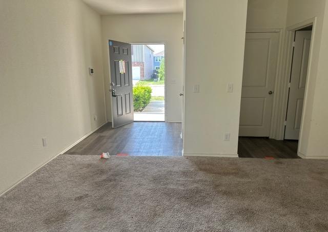 12614 Galatea, San Antonio, TX 78245 - entryway with carpet floors and baseboards