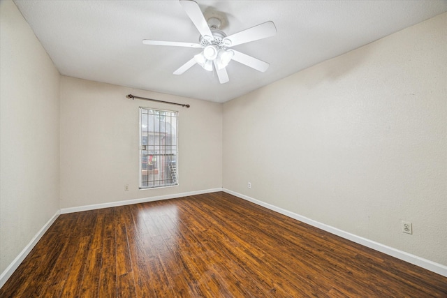 12955 Woodforest Blvd Unit 30, Houston, TX 77015 - spare room with dark wood-style floors and ceiling fan