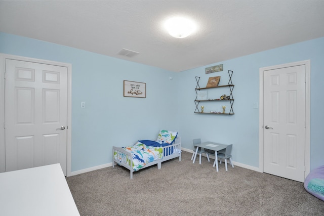 2808 Apache St, League City, TX 77573 - carpeted bedroom with baseboards