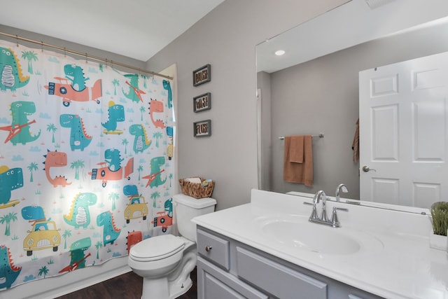 2808 Apache St, League City, TX 77573 - bathroom with vanity, wood finished floors, and recessed lighting