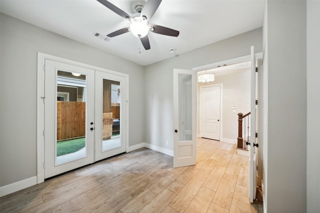 1219 W 25th St Unit D, Houston, TX 77008 - empty room with french doors, light wood-type flooring, and ceiling fan
