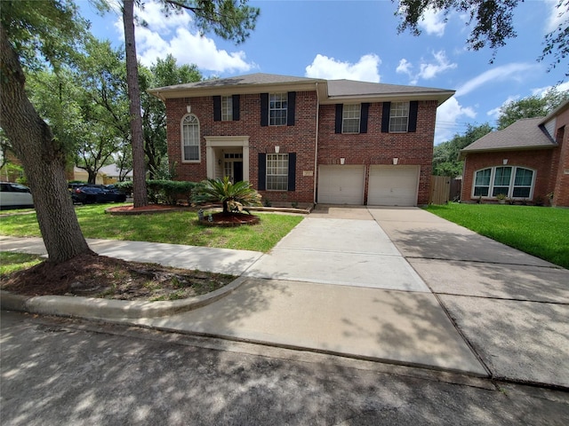 1631 Almond Brook Ln, Houston, TX 77062 - view of front facade featuring a garage, brick siding, driveway, and a front lawn