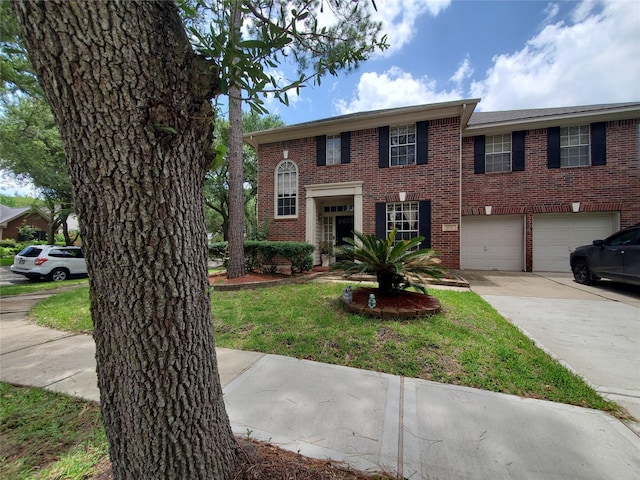 1631 Almond Brook Ln, Houston, TX 77062 - view of front of property featuring concrete driveway, an attached garage, and brick siding