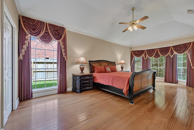 6102 Walkers Park Dr, Sugar Land, TX 77479 - bedroom featuring light wood finished floors, vaulted ceiling, and a ceiling fan