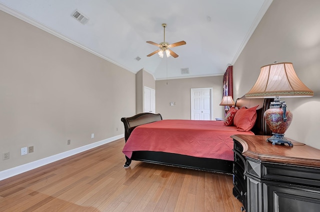 6102 Walkers Park Dr, Sugar Land, TX 77479 - bedroom with light wood finished floors, crown molding, vaulted ceiling, and a ceiling fan