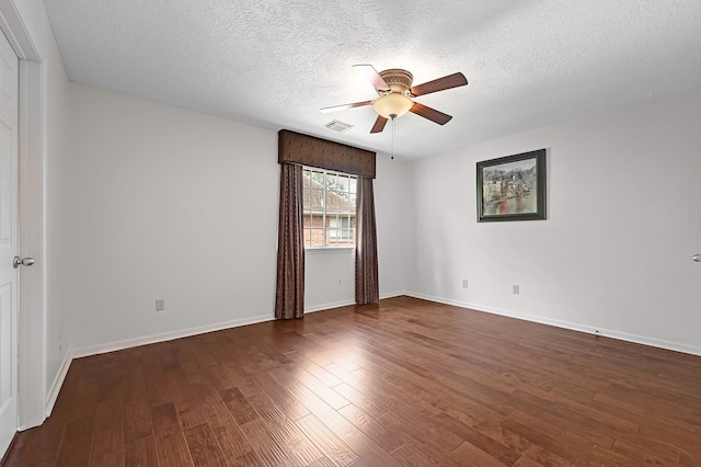 6102 Walkers Park Dr, Sugar Land, TX 77479 - unfurnished room featuring ceiling fan, a textured ceiling, and dark wood finished floors