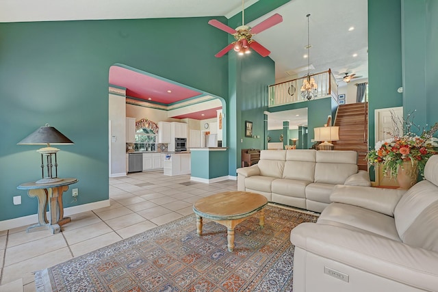 6102 Walkers Park Dr, Sugar Land, TX 77479 - living room with a ceiling fan, high vaulted ceiling, and light tile patterned floors