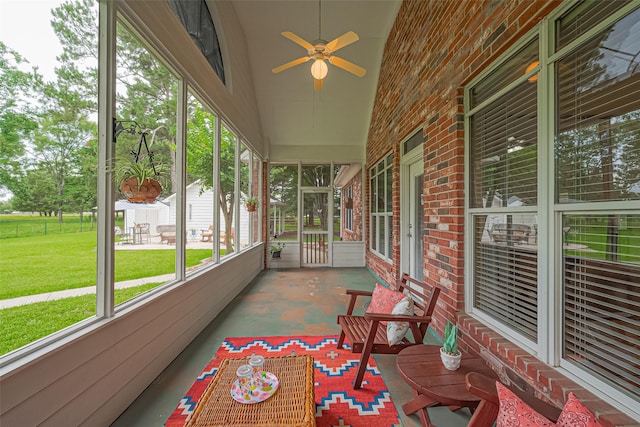 13820 Midway Dr, Willis, TX 77318 - sunroom with ceiling fan and plenty of natural light