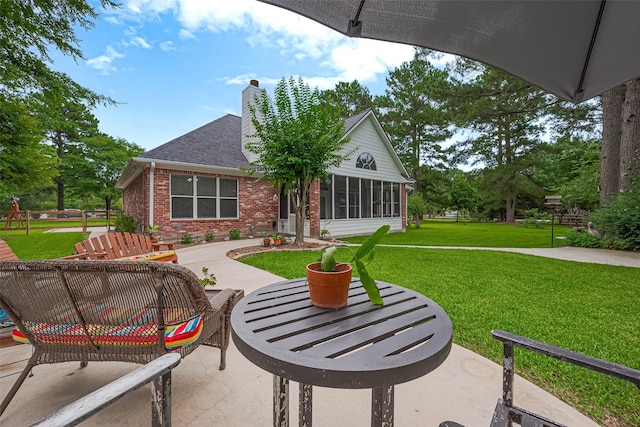 13820 Midway Dr, Willis, TX 77318 - view of patio / terrace with a sunroom