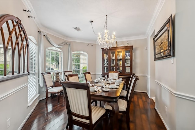 3318 Legends Mist Dr, Spring, TX 77386 - dining room with a chandelier, dark wood-style floors, and crown molding
