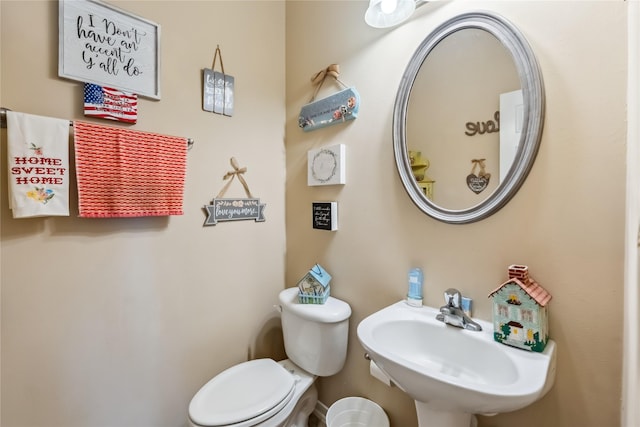 3318 Legends Mist Dr, Spring, TX 77386 - half bathroom with a sink and toilet